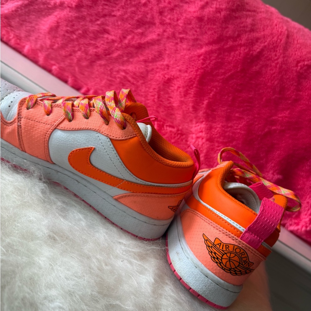 Nike woman’s Orange, pink, peach, and White Sneakers